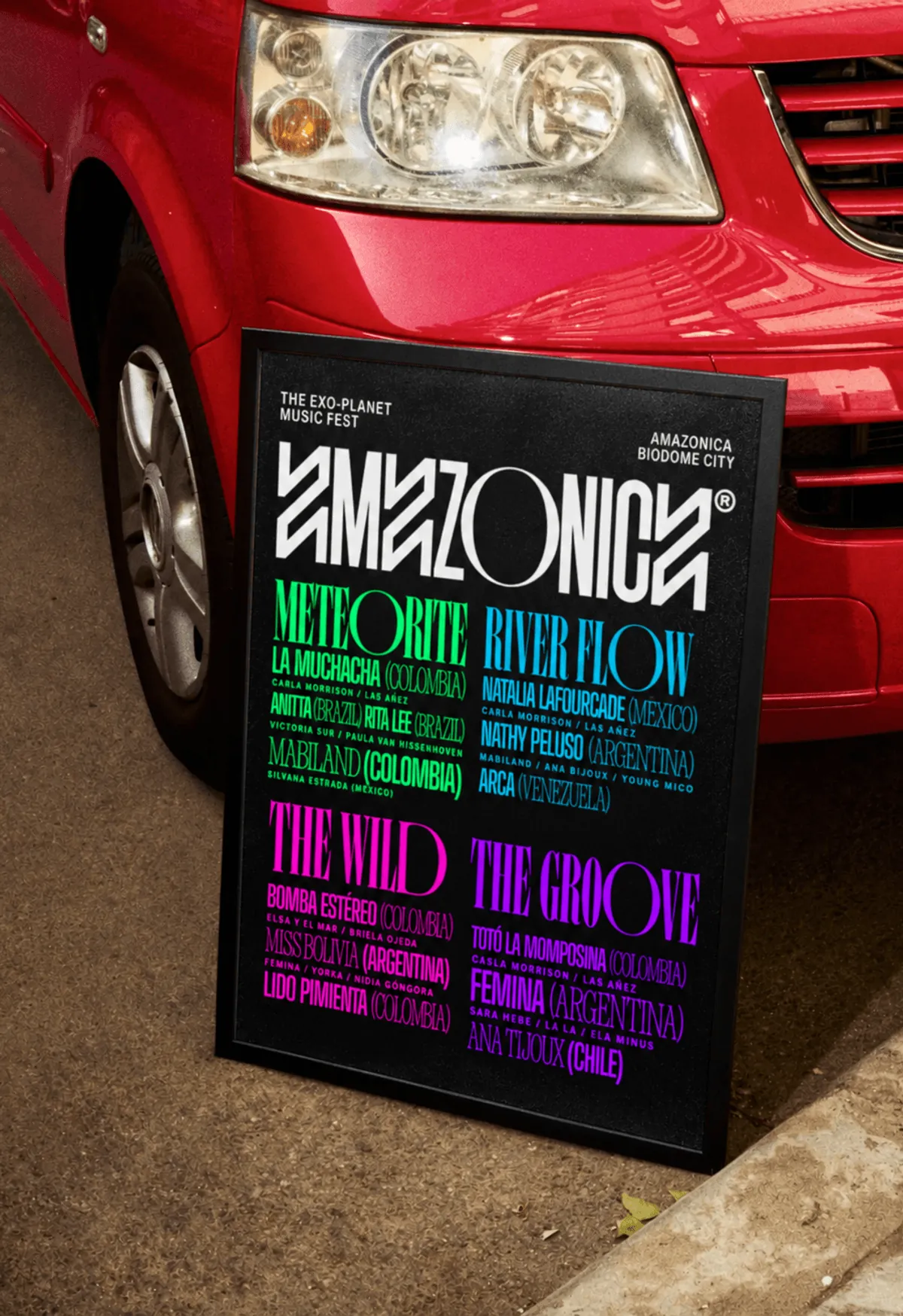Line-up poster leaning against a red car
