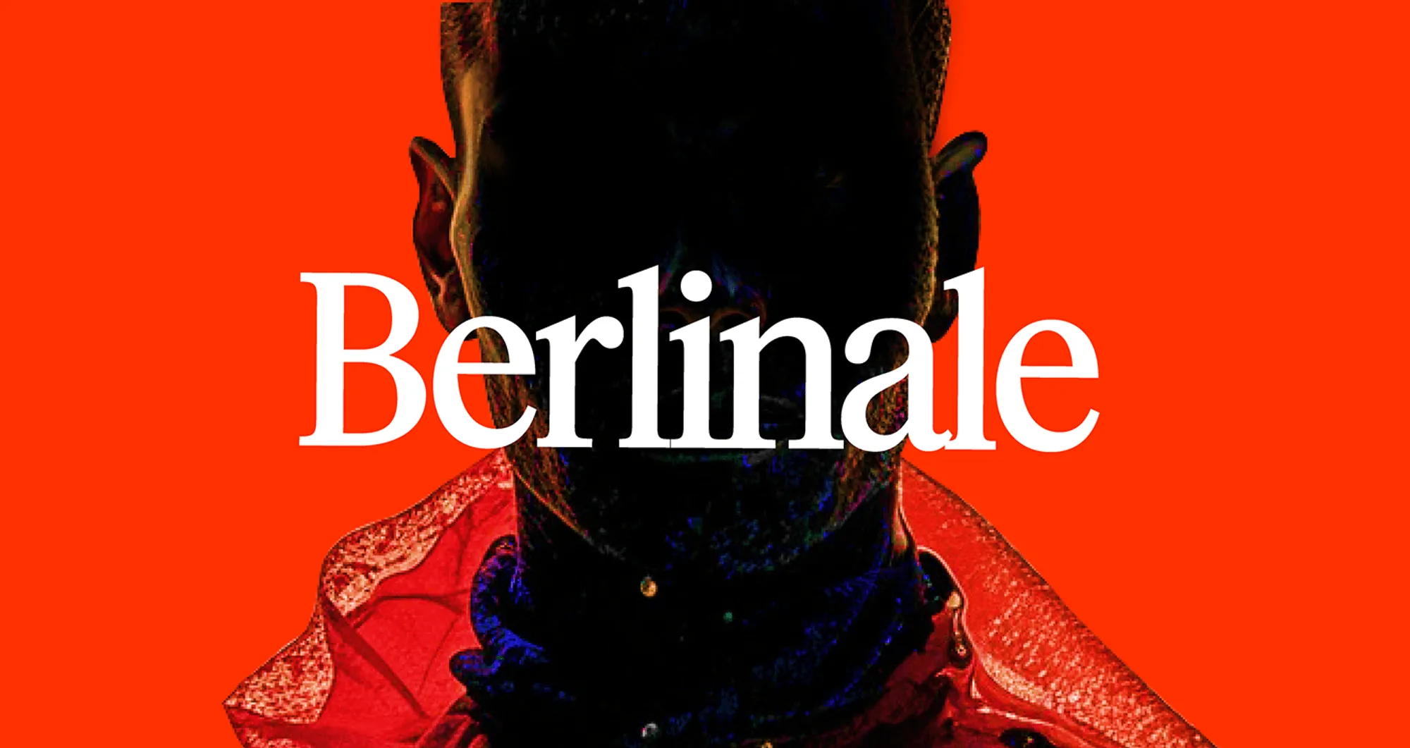 Berlinale key visual: a figure in a red coat behind the Berlinale wordmark