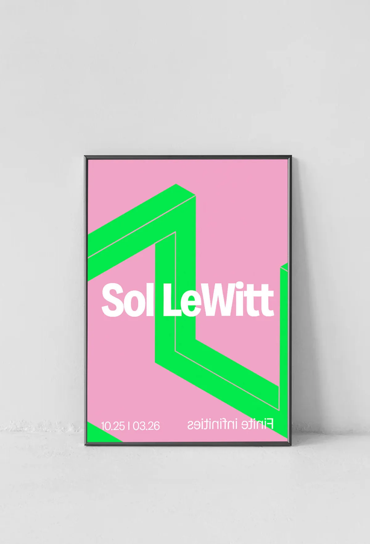 Pink and green Sol LeWitt poster against a wall
