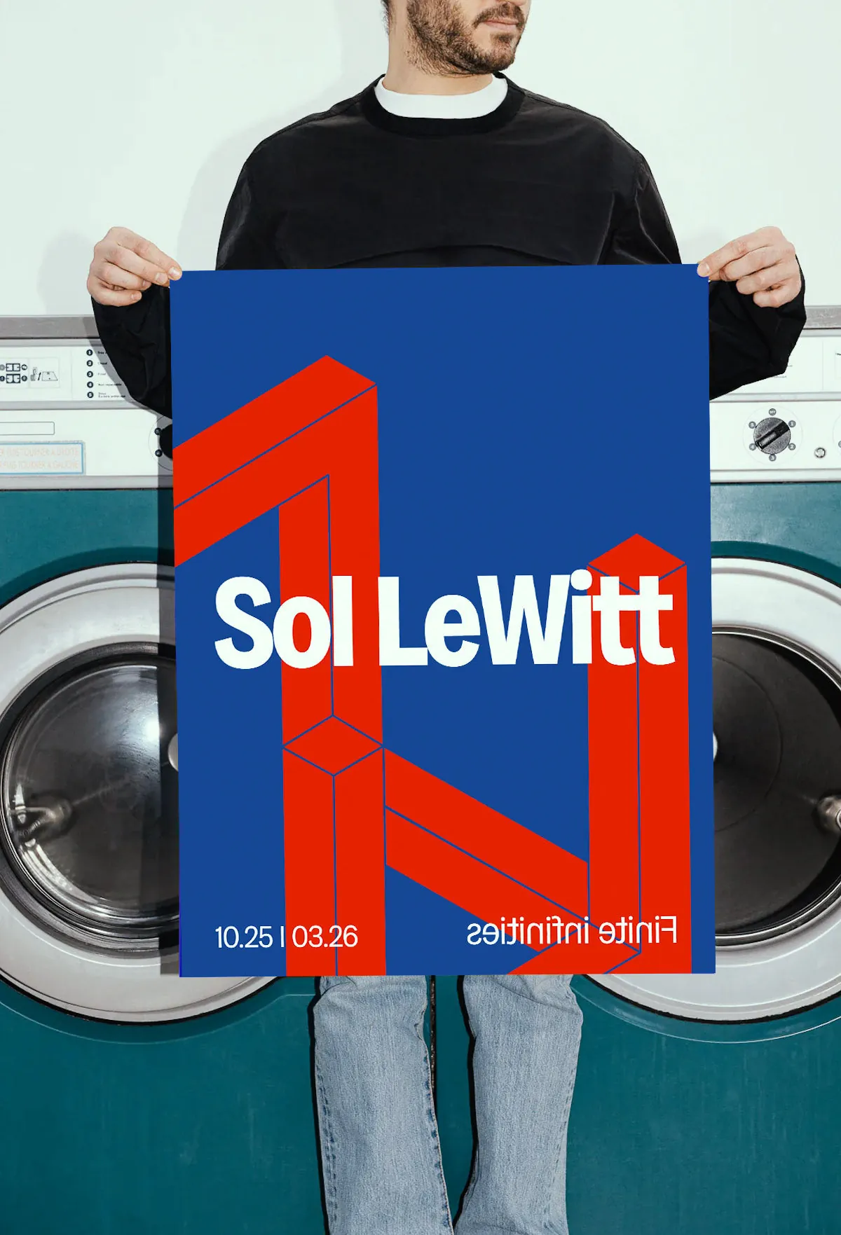 Person holding a blue and red Sol LeWitt poster