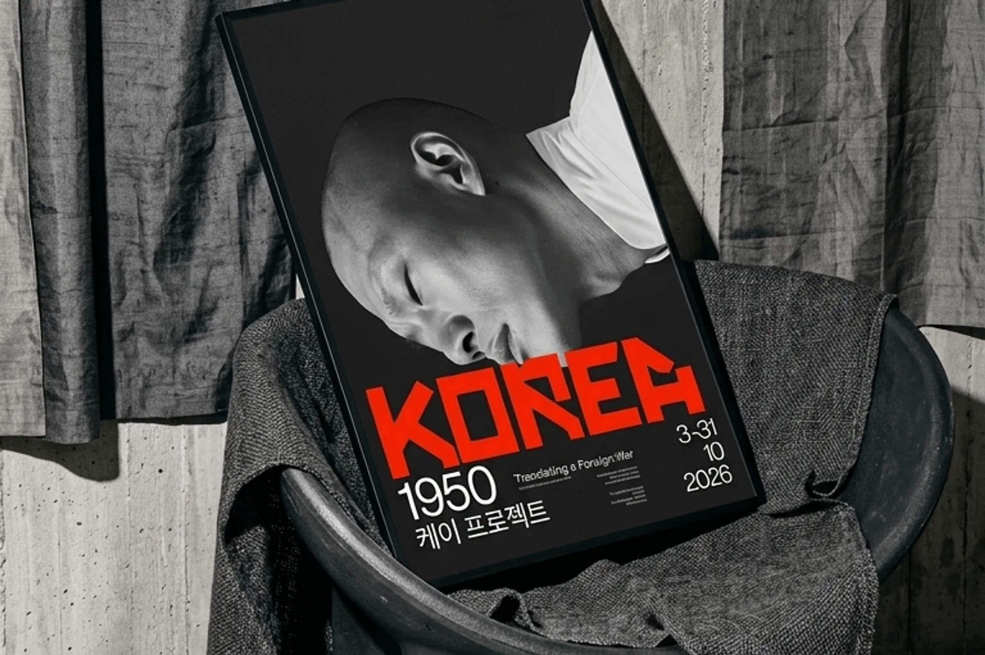 Poster of a man with KOREA 1950 typography against grey fabric