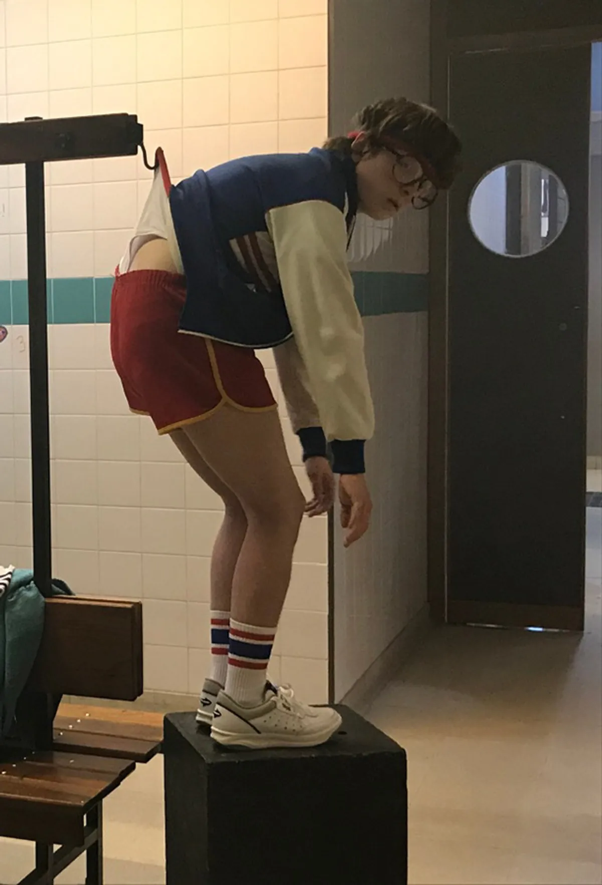 Behind the scenes: an actor on a platform